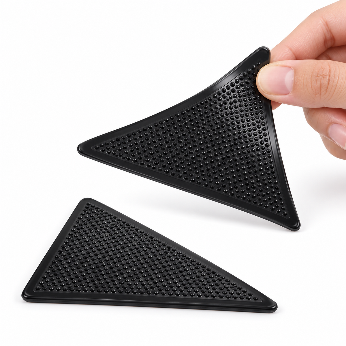 Close-up of the thin triangular rug gripper and textured gripping surface